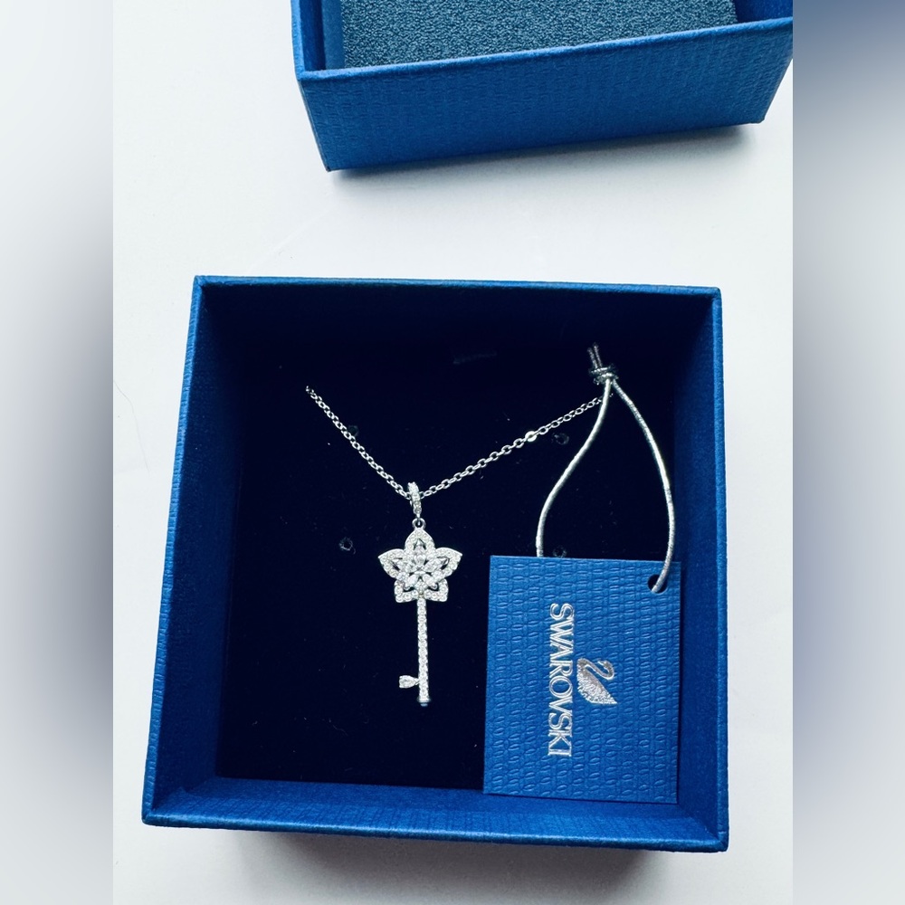 Rare, Swarovski Silver Lady Key Pendant Necklace NWT in Box.